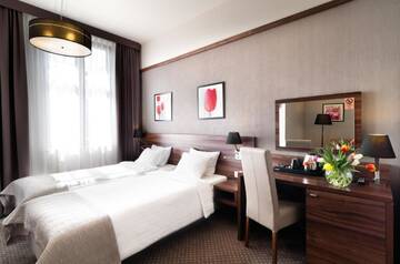 Фото номера Двухместный номер с 1 кроватью Отель Golden Tulip Krakow City Center г. Краков 4