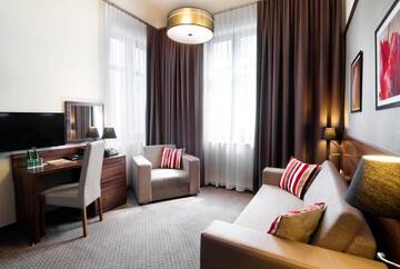 Фото номера Семейный номер (для 2 взрослых и 2 детей) Отель Golden Tulip Krakow City Center г. Краков 5