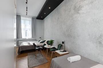 Фото номера Трехместный номер с общей ванной комнатой Апартаменты Rainbow Apartments 3 г. Краков 12
