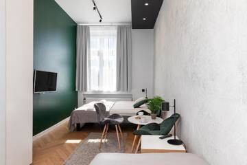 Фото номера Трехместный номер с общей ванной комнатой Апартаменты Rainbow Apartments 3 г. Краков 10