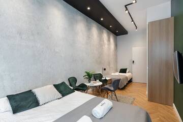 Фото номера Трехместный номер с общей ванной комнатой Апартаменты Rainbow Apartments 3 г. Краков 11