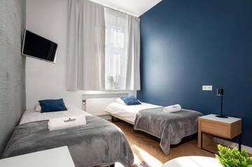 Фото номера Апартаменты с 4 спальнями Апартаменты Rainbow Apartments 3 г. Краков 25