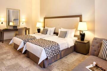 Фото номера Улучшенный семейный номер Отель Metropolitan Boutique Hotel г. Краков 4