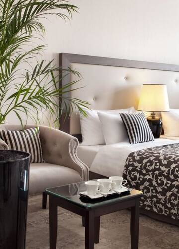 Фото номера Трехместный номер Отель Metropolitan Boutique Hotel г. Краков 4