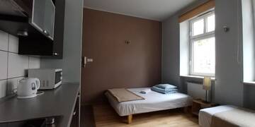 Фото номера Улучшенный двухместный номер с 1 кроватью или 2 отдельными кроватями Хостелы 999 Aparthostel г. Краков 27