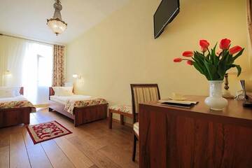Фото номера Двухместный номер с 2 отдельными кроватями Апарт-отели Aparthotel Grodzka 21 г. Краков 6