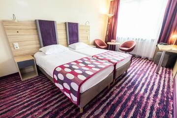 Фото номера Стандартный двухместный номер с 2 отдельными кроватями Отель Galaxy Hotel г. Краков 7