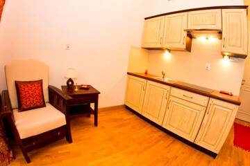 Фото номера Апартаменты с видом на сад Апартаменты Apartament Kopernik г. Краков 45