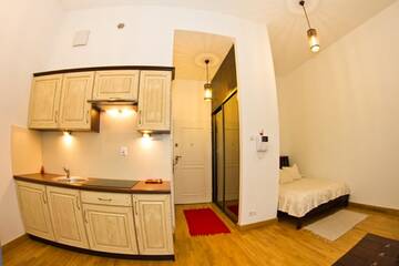 Фото номера Апартаменты с видом на сад Апартаменты Apartament Kopernik г. Краков 25