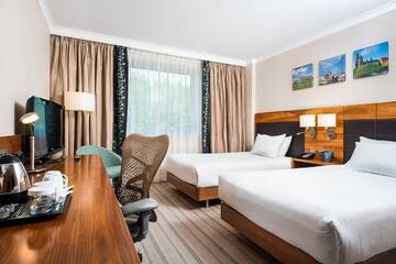 Фото номера Двухместный номер с 2 отдельными кроватями Отель Hilton Garden Inn Krakow г. Краков 2