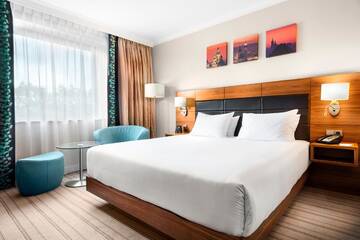 Фото номера Номер с кроватью размера «king-size» Отель Hilton Garden Inn Krakow г. Краков 5