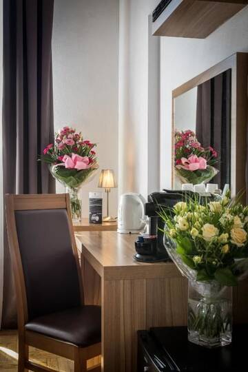 Фото номера Двухместный номер с 2 отдельными кроватями Апарт-отели Aparthotel Pergamin г. Краков 8