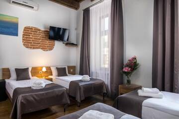 Фото номера Четырехместный номер Апарт-отели Aparthotel Pergamin г. Краков 4