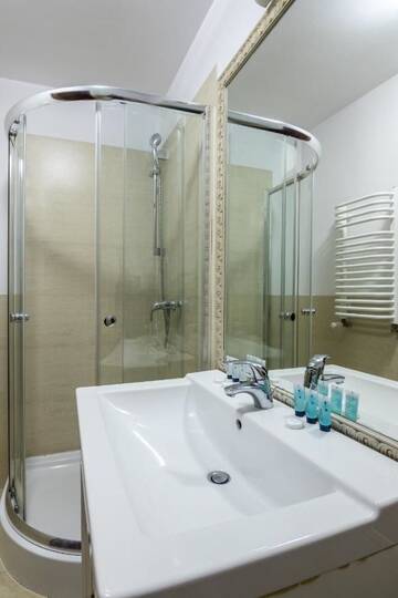 Фото номера Трехместный номер Апарт-отели Aparthotel Pergamin г. Краков 7