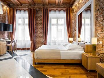Фото номера Улучшенный номер-студио Делюкс Апарт-отели Aparthotel Stare Miasto г. Краков 3