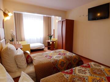 Фото номера Трехместный номер с мини-кухней Апарт-отели Aparthotel Adler г. Краков 9