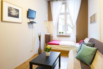 Фото номера Апартаменты с 3 спальнями Апартаменты Berry Apartments г. Краков 4