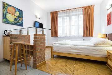 Фото номера Номер-студио Апартаменты Krowoderska Apartments г. Краков 2