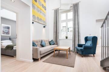 Фото номера Двухуровневый семейный люкс Апарт-отели Venetian House Market Square Aparthotel г. Краков 4