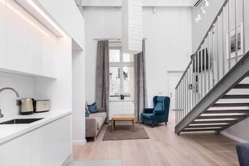 Фото номера Двухуровневый семейный люкс Апарт-отели Venetian House Market Square Aparthotel г. Краков 2