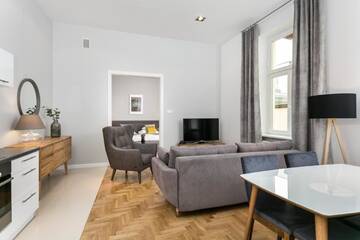 Фото номера Семейный люкс Апарт-отели Venetian House Market Square Aparthotel г. Краков 4