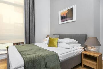 Фото номера Улучшенный двухместный номер с 1 кроватью Апарт-отели Venetian House Market Square Aparthotel г. Краков 5