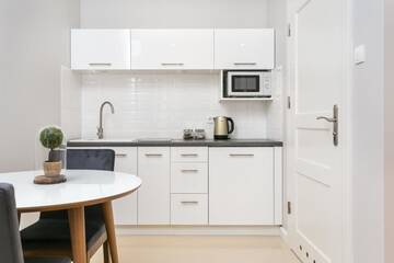 Фото номера Улучшенный двухместный номер с 2 отдельными кроватями Апарт-отели Venetian House Market Square Aparthotel г. Краков 4