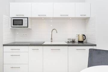 Фото номера Улучшенный двухместный номер с 1 кроватью Апарт-отели Venetian House Market Square Aparthotel г. Краков 10