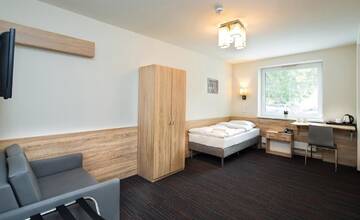 Фото номера Семейный люкс (для 2 взрослых и 2 детей) Отель Automobil Hotel г. Краков 3