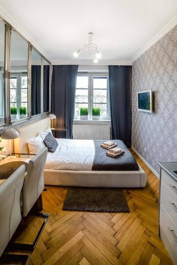 Фото Апартаменты Cracovia Apartments г. Краков 4
