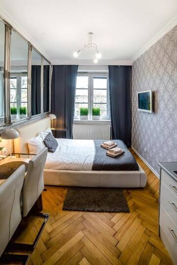 Фото номера Апартаменты-студио с гидромассажной ванной Апартаменты Cracovia Apartments г. Краков 11
