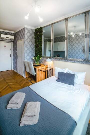 Фото номера Апартаменты-студио с гидромассажной ванной Апартаменты Cracovia Apartments г. Краков 12