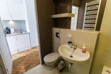 Фото номера Апартаменты-студио с гидромассажной ванной Апартаменты Cracovia Apartments г. Краков 20