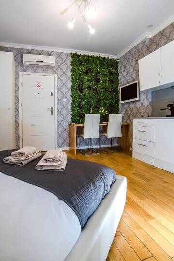 Фото номера Апартаменты-студио с балконом Апартаменты Cracovia Apartments г. Краков 4