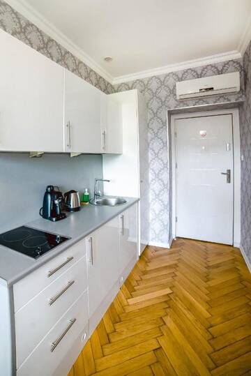 Фото номера Апартаменты-студио с гидромассажной ванной Апартаменты Cracovia Apartments г. Краков 6