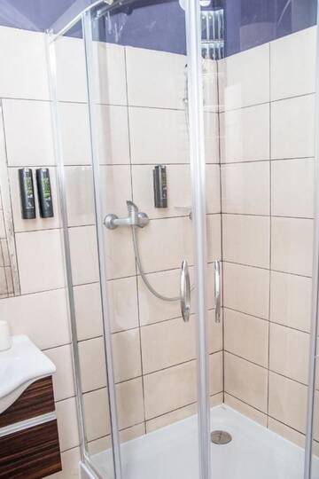Фото номера Апартаменты с 1 спальней (для 4 взрослых) Апартаменты Red Kurka Apartments г. Краков 14