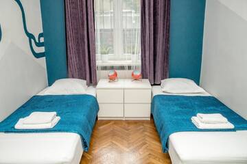 Фото номера Апартаменты с 2 спальнями (для 6 взрослых) Апартаменты Red Kurka Apartments г. Краков 3