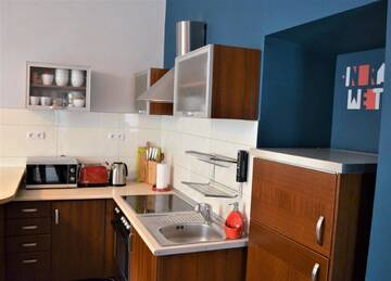 Фото номера Апартаменты с 2 спальнями (для 6 взрослых) Апартаменты Red Kurka Apartments г. Краков 12