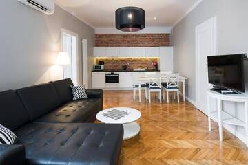 Фото номера Апартаменты с 2 спальнями (8 взрослых) Апарт-отели Main Market Square Apartments г. Краков 5