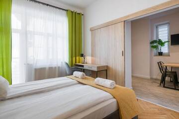 Фото номера Апартаменты с 1 спальней (для 4 взрослых) Апарт-отели Main Market Square Apartments г. Краков 6