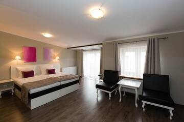 Фото номера Четырехместный номер Апарт-отели Leone Aparthotel г. Краков 4