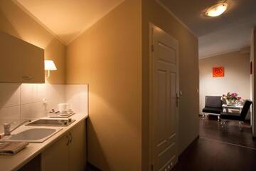 Фото номера Апартаменты с мини-кухней (для 4 взрослых) Апарт-отели Leone Aparthotel г. Краков 8
