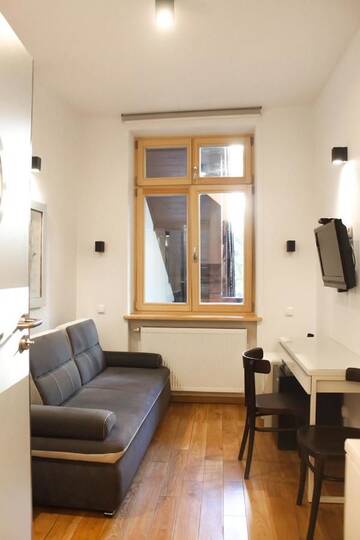 Фото номера Двухместный номер с 1 диваном-кроватью Апартаменты Sewa Apartments г. Краков 2