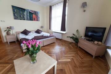 Фото номера Улучшенные апартаменты с видом на Малый рынок. Апартаменты Place 4 You Apartments г. Краков 3