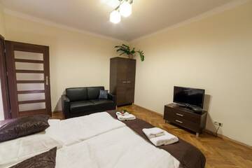 Фото номера Улучшенные апартаменты с видом на улицу Сиенна Апартаменты Place 4 You Apartments г. Краков 3