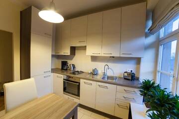 Фото номера Улучшенные апартаменты с видом на Малый рынок. Апартаменты Place 4 You Apartments г. Краков 8