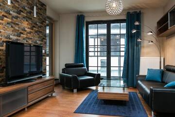 Фото номера Улучшенные апартаменты с 1 спальней Апарт-отели EXCLUSIVE Aparthotel г. Краков 4