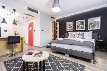 Фото номера Апартаменты с балконом и проектором Апарт-отели Inpoint Smart Apartments г. Краков 4