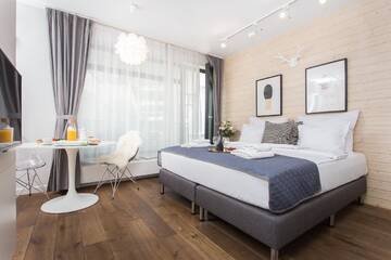 Фото номера Апартаменты-студио с балконом Апарт-отели Inpoint Smart Apartments г. Краков 2