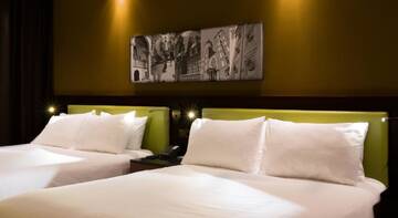 Фото номера Двухместный номер с 2 отдельными кроватями Отель Hampton by Hilton Krakow г. Краков 4